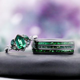 Moss agate and emerald couples ring set displayed side by side