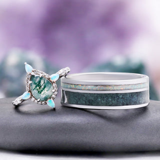 Moss Agate & Fire Opal Couple Ring Set by Aquamarise, an opal-accented moss agate ring beside a matching men's inlay band.