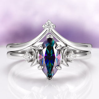 Mystic Moissanite Engagement Ring Celestial Moon Ring over light purple background
