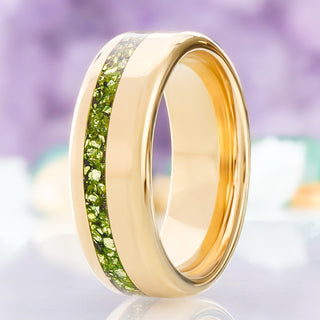 Off-set crushed peridot men's wedding band in polished gold tungsten, 8mm dome with a natural green inlay channel