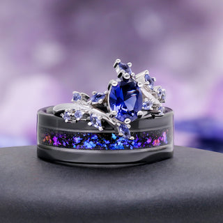 Orion Nebula black tungsten band beside the cornflower sapphire leaf ring