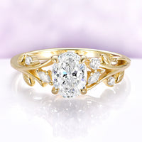 Oval lab-grown diamond leaf and vine engagement ring in solid 14K yellow gold