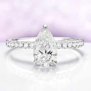 Pear Moissanite Engagement Ring in 14K White Gold (Hidden Halo)