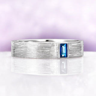 Celtic Natural London Blue Topaz Couples Ring Set by Aquamarise, featuring a textured sterling silver band with a rectangular London Blue Topaz gemstone, part of Matching Couples' Rings collection.