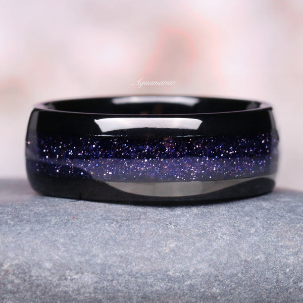 Starry Night Wedding Band- 8MM Black Tungsten featuring a shimmering crushed galaxy stone inlay on a polished black tungsten band by Aquamarise for men’s wedding bands.