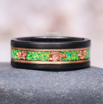 Green Fire Opal & Rose Gold Leaf Wedding Band in Two-Tone Tungsten Carbide (8mm) by Aquamarise featuring vibrant green opal inlay with delicate rose gold leaf accents on a sleek black band.