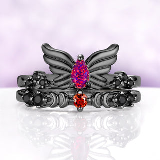 Selene wing ring stacked with the Selene padparadscha sapphire crescent moon band, sold separately, in black ruthenium