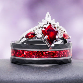 Kite cut garnet ring stacked on the hammered black and silver band with crushed garnet inlay