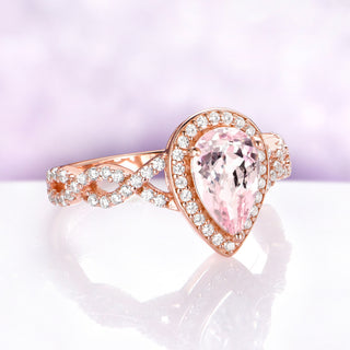 Teardrop Morganite Engagement Ring in 14K Rose Gold Vermeil by Aquamarise, angled view showing the blush morganite halo and twisted shoulders.