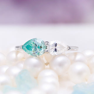 Toi Et Moi Blue Moissanite Two Stone Engagement Ring by Aquamarise, close-up of the two center stones