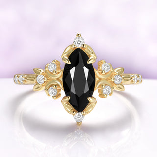 Marquise black onyx engagement ring in 14K yellow gold vermeil with crescent moons and leaf shoulders