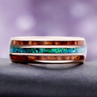 Side profile of the 8mm tungsten band with wood and opal inlay