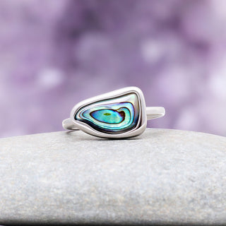 Abalone paua shell ring in sterling silver with a bezel-set free-form blue and green shell