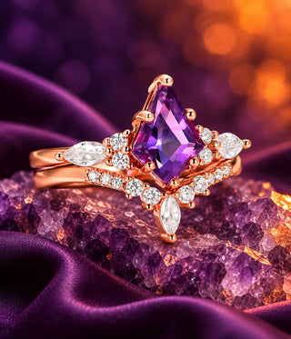 Rose gold bridal set: kite-cut purple amethyst engagement ring with marquise and pear accents and a curved matching band, on amethyst over purple satin, Aquamarise banner