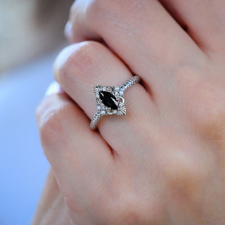 Arwen Black Onyx & Pearl Ring in Sterling Silver worn on the hand, angled view
