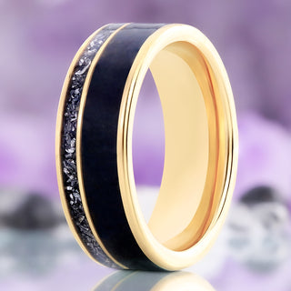 Standing view of the black onyx and meteorite men's wedding band in yellow gold tungsten showing the polished gold interior