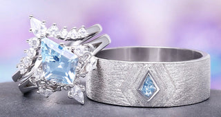 Two silver rings with gemstones on a gradient background