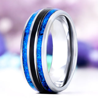Blue Fire Opal & Black Onyx men's wedding band in polished tungsten, 8mm, standing upright with twin blue opal inlays flanking a black onyx stripe