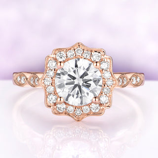 Cordelia Milgrain Halo Lab-Grown Diamond Engagement Ring in 14K Rose Gold by Aquamarise, front view of the round lab-grown diamond in a scalloped milgrain halo on a marquise-accented band