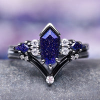 Kite cut galaxy sandstone ring set in black ruthenium