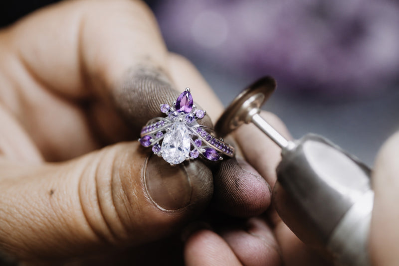 Aquamarise jeweler hand-finishing the Feyra custom ring at the bench