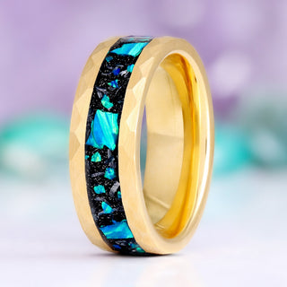 Fire Opal and meteorite men's wedding band standing upright, hammered gold tungsten carbide with a blue opal and meteorite inlay