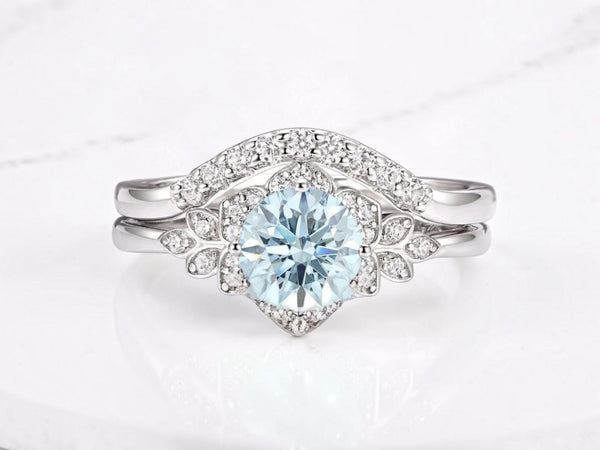 Flower and leaf engagement ring by Aquamarise with sculpted petal detailing