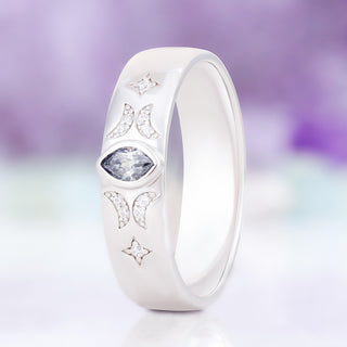 Gray Moissanite Celestial wedding band in sterling silver, 6mm, standing upright with the bezel-set marquise gray moissanite, pavé crescent moons and stars