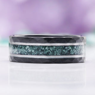 Front view of the 8mm Green Moss Agate hammered men's wedding band in black and silver tungsten with a crushed moss agate inlay