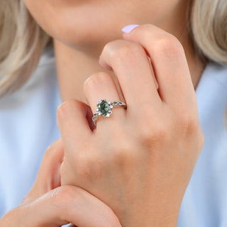 Green moss agate Woodland Twirl ring worn on a model's hand