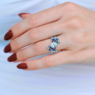 Oval Cut Moissanite & Blue Sapphire Leaf Engagement Ring Set in 14K White Gold