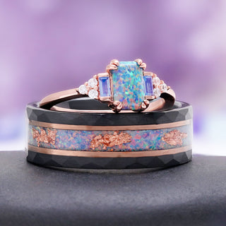 Light Blue Fire Opal and opalescent sapphire engagement ring in rose gold vermeil resting on the men's black tungsten opal band