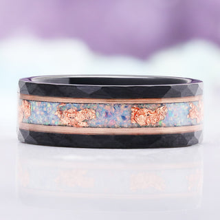 Front view of the 8mm Light Blue Fire Opal men's wedding band in black tungsten with rose gold rails and a blue opal inlay