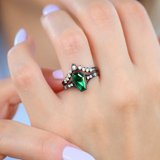 Lilith Coffin Cut Emerald Ring Set in Black Ruthenium worn on the hand