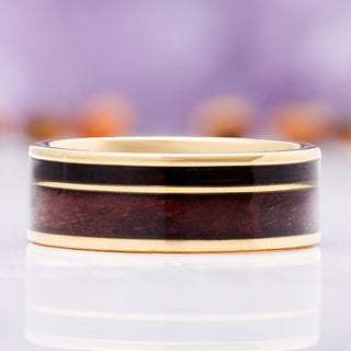 Front view of the 8mm M1 Garand and purpleheart wood wedding band in gold tungsten carbide with twin gold rails framing the wood inlay