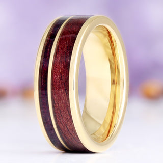 M1 Garand and purpleheart wood men's wedding band standing upright, gold tungsten carbide with a deep purple wood inlay