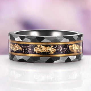 Ring with geometric design and gold accents on a gradient background