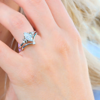 Moissanite crescent moon ring set worn on a model's hand