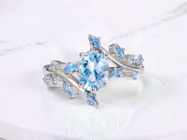 Moss agate leaf engagement ring by Aquamarise shown in a ring style banner