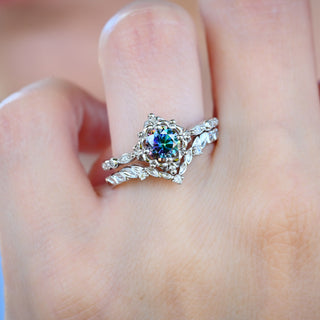 Mystical Fairy Rainbow Moissanite Ring Set in Sterling Silver worn on the hand, angled view