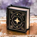 Night Court handmade leather book ring box in black and gold by Aquamarise with embossed cover design