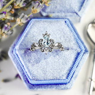 Odette Pear Aquamarine Tiara Engagement Ring in Sterling Silver in a blue velvet ring box