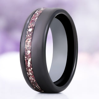 Off-set crushed morganite men's wedding band in polished black tungsten, 8mm, standing view showing the pink morganite channel with silver flecks