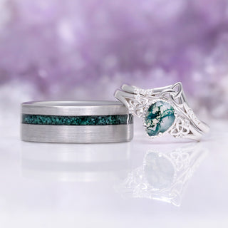 The moss agate tungsten band shown beside the matching Celtic knot moss agate ring set in sterling silver