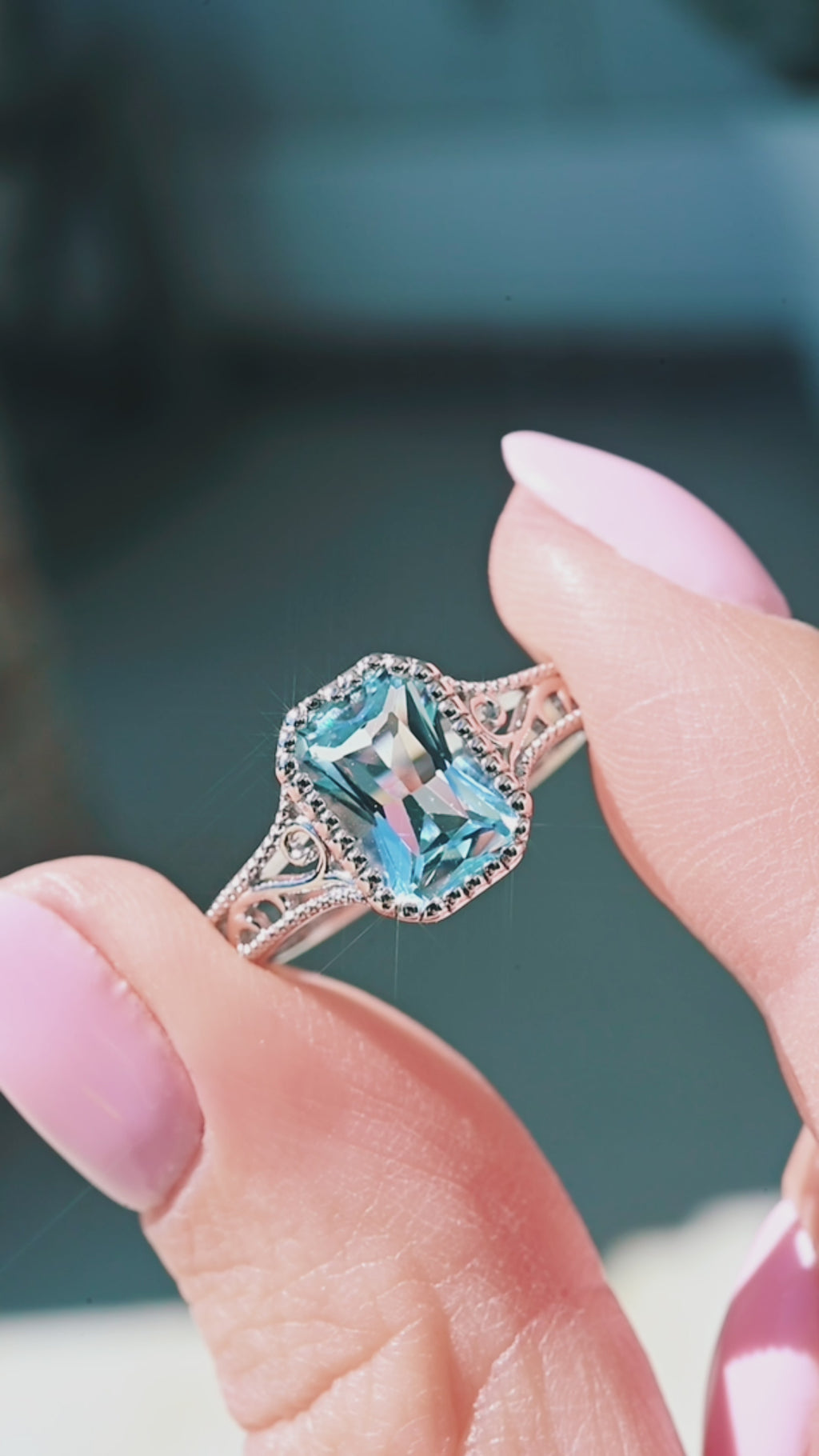 Video of a vintage bezel set aquamarine ring by Aquamarise, shown in motion