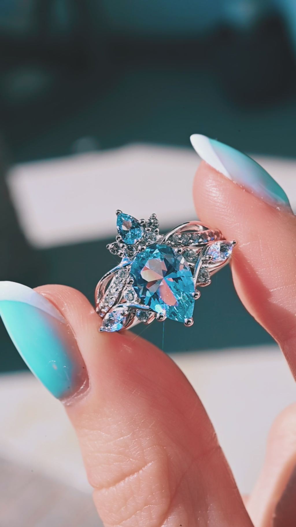Product video of the Feyra Aquamarine Crown Wedding Band in 14K White Gold by Aquamarise, showing the aquamarine crown silhouette.