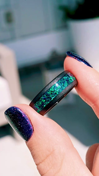 Video of the crushed peacock opal band in sandblasted black tungsten catching the light