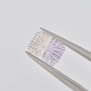 Natural Ametrine rectangle 6 x 8 mm Faelight Cut video, turning to show the starburst flashes