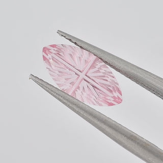 Lab-Grown Pink Sapphire marquise 5 x 10 mm Faelight Cut video, turning to show the starburst flashes