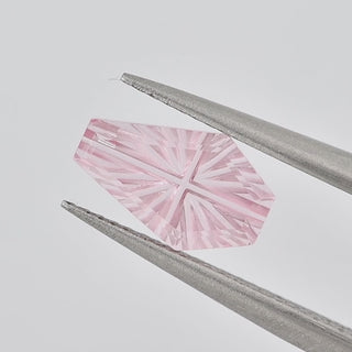 Lab-Grown Pink Sapphire coffin 6 x 10 mm Faelight Cut video, turning to show the starburst flashes